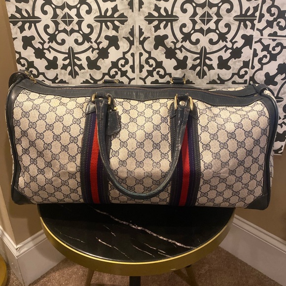 Gucci Handbags - Gucci Duffle Sherryline Navy GUC with working lock and key